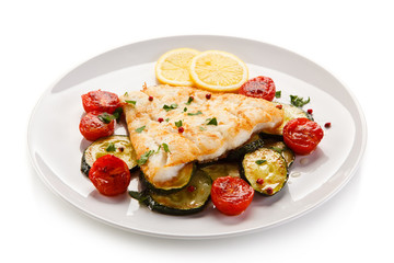 Fish dish - roast cod fillet and vegetables 