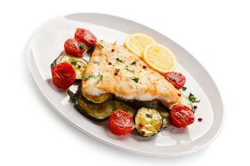 Fish dish - roast cod fillet and vegetables 