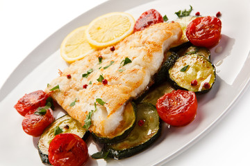 Fish dish - roast cod fillet and vegetables 