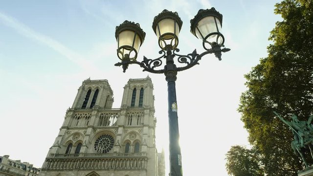 The Notre Dame with an old street light in front.