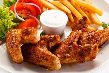 Fried chicken wings with french fries 