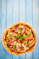 Pizza with ham and pepper 