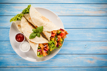 Tortilla wrap with meat and vegetables 