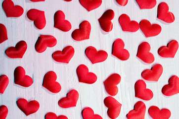 Red hearts on a textured background.