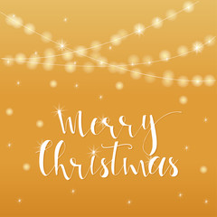Fototapeta premium Wonderful and unique festive golden luminous background with Christmas wishes for holiday greeting cards. Hand drawn lettering with blurred bokeh.