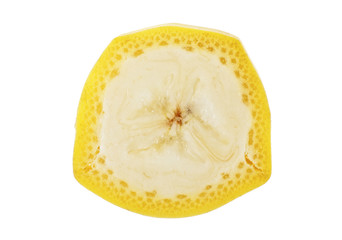 Slice of banana on a white background, top view