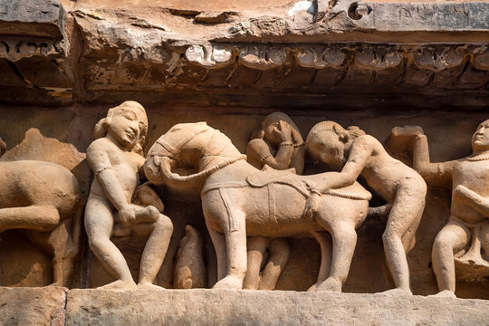 Close up erotic stone carving in Lakshman Temple