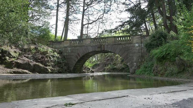 Victorian stone bridge over water