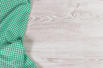 Cloth napkin on wooden background.