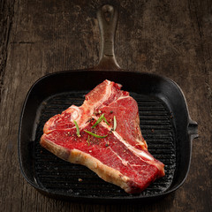 fresh raw T bone steak