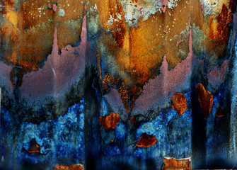 Colorful abstract created by enhancing rust on a metal building