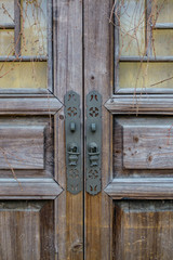 old Chinese style wooden door with metal  locks