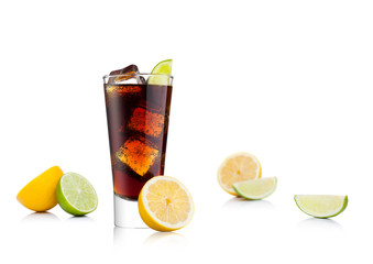 Glass of cold cola soda drink with lime and lemon
