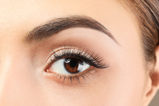 Fototapeta Beautiful young woman with eyelash extensions, closeup