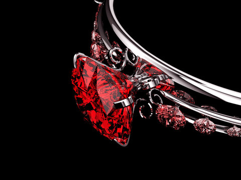 Section of Red ruby diamond ring isolated on black background