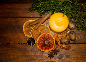 christmas ornaments with candles apples pines and pineapples