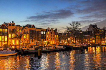 Lights along the canals of Amsterdam at dusk