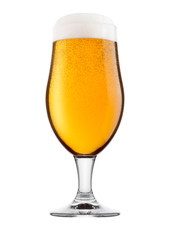 Cold glass of lager beer with foam and dew