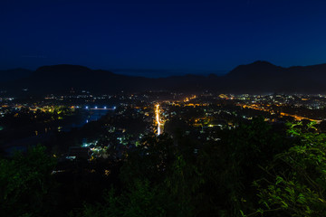 night scene of cityscape from viewpoint at Mount Phousi