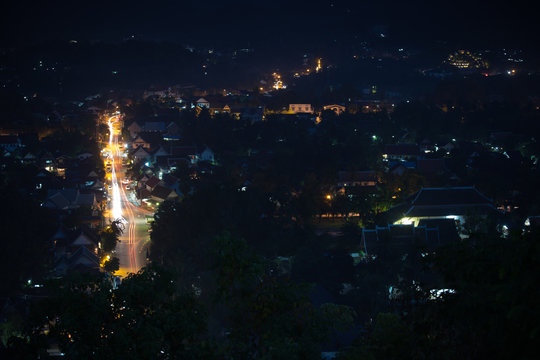 night scene of cityscape from viewpoint at Mount Phousi