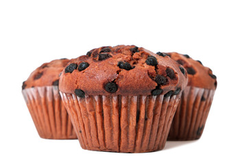 Muffin chocolate chip cup cake or cupcake three group cluster isolated on white background photo