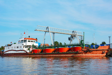 The bunkering ship at the pier