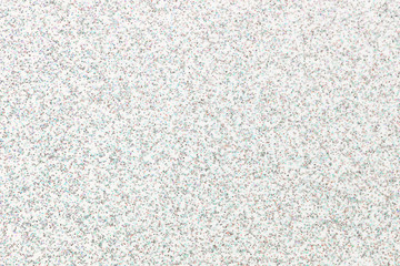 colorful diamond powder on white wooden board