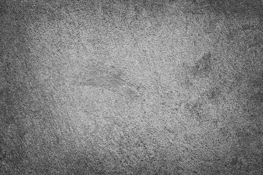 Surface of black and white colored concrete walkways background.