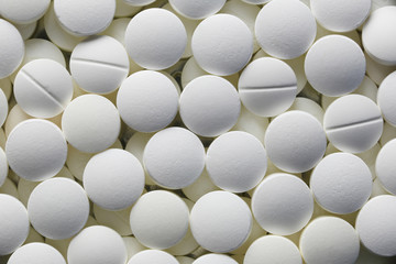 White Pill tablet background.