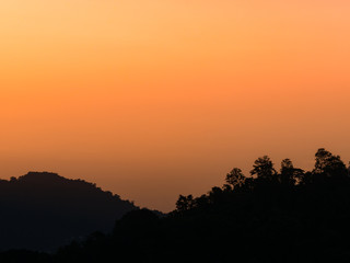 the beautiful  sky with cloudy background and silhouette mountain in twilight time.