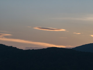 the beautiful  sky with cloudy background and silhouette mountain in the evening