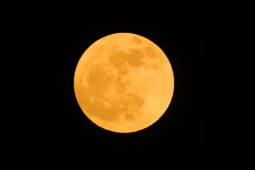 Papier Peint photo Lavable Pleine lune the detail of yellow full moon on black background, zoom image