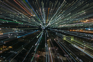 light lines with long exposure,  speed motion abstract background in the dark night ,  blast zoom effect , zoom burst of light in the city