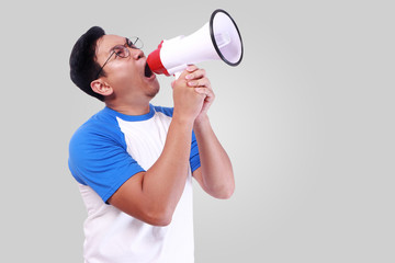 Young Man Shouting with Megaphone, Promotion Concept