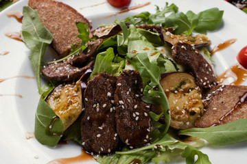 baked meat with grilled vegetables salad. healthy food. closeup concept. proper and delicious nutrition.