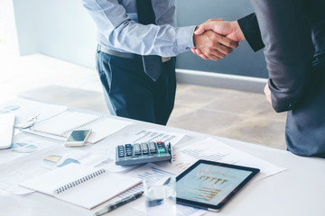 Business people colleagues shaking hands meeting Planning Strategy Analysis Concept
