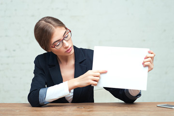 Business woman show white paper