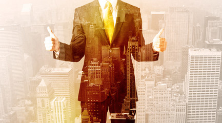 Business man looking at overlay city background