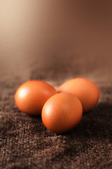  Eggs on wooden  background closeup, Easter or natural healthy food concept