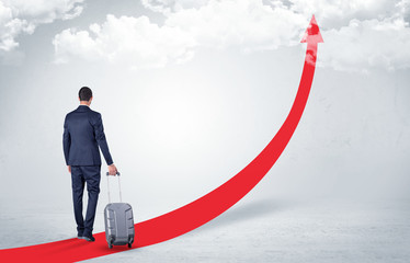 Obraz premium Businessman leaving on the red carpet arrow