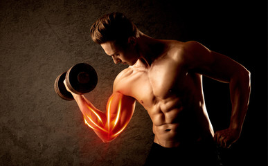 Fit bodybuilder lifting weight with red muscle concept