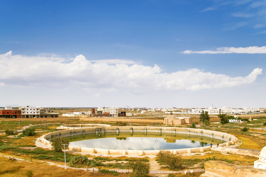 Aghlabid Basins, reservoir outside city walls. Panorama view from above. Kairouan, Tunisia