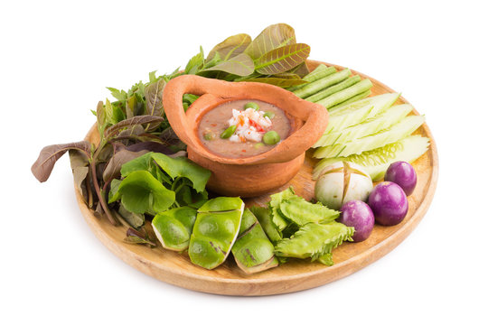 Shrimp paste the ingredients of "nam prik gapi" Thai flavors food, Chili dip and vegetable isolated on white background