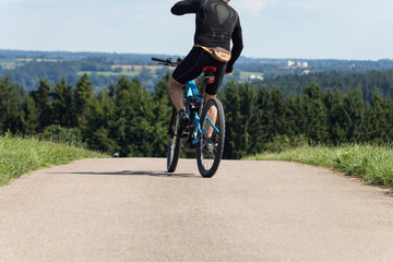 cyclists on a summer sunny day in south german countryside © rudolfgeiger