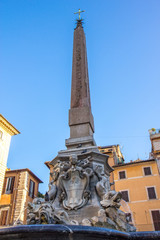 Fototapeta na wymiar Fontana del Pantheonin the Piazza della Rotonda, Rome, in front of the Roman Pantheon.