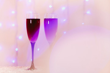 toast of champagne glasses background blurred lights red pink new year