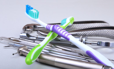 dental care toothbrush with dentist tools isolated on white background. Selective focus.