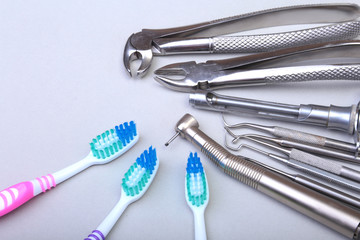 dental care toothbrush with dentist tools isolated on white background. Selective focus.