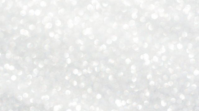 white glitter and bokeh for a background.
