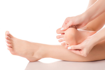 Obraz na płótnie Canvas Female feet heel massage